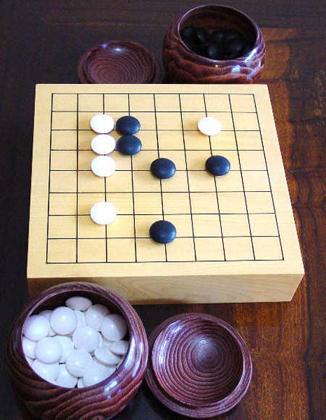 Китайская игра с камнями. Го Бадук Вейчи. Японская игра го. Японские шашки. Японские шашки го.